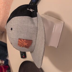 Black and grey trucker hat